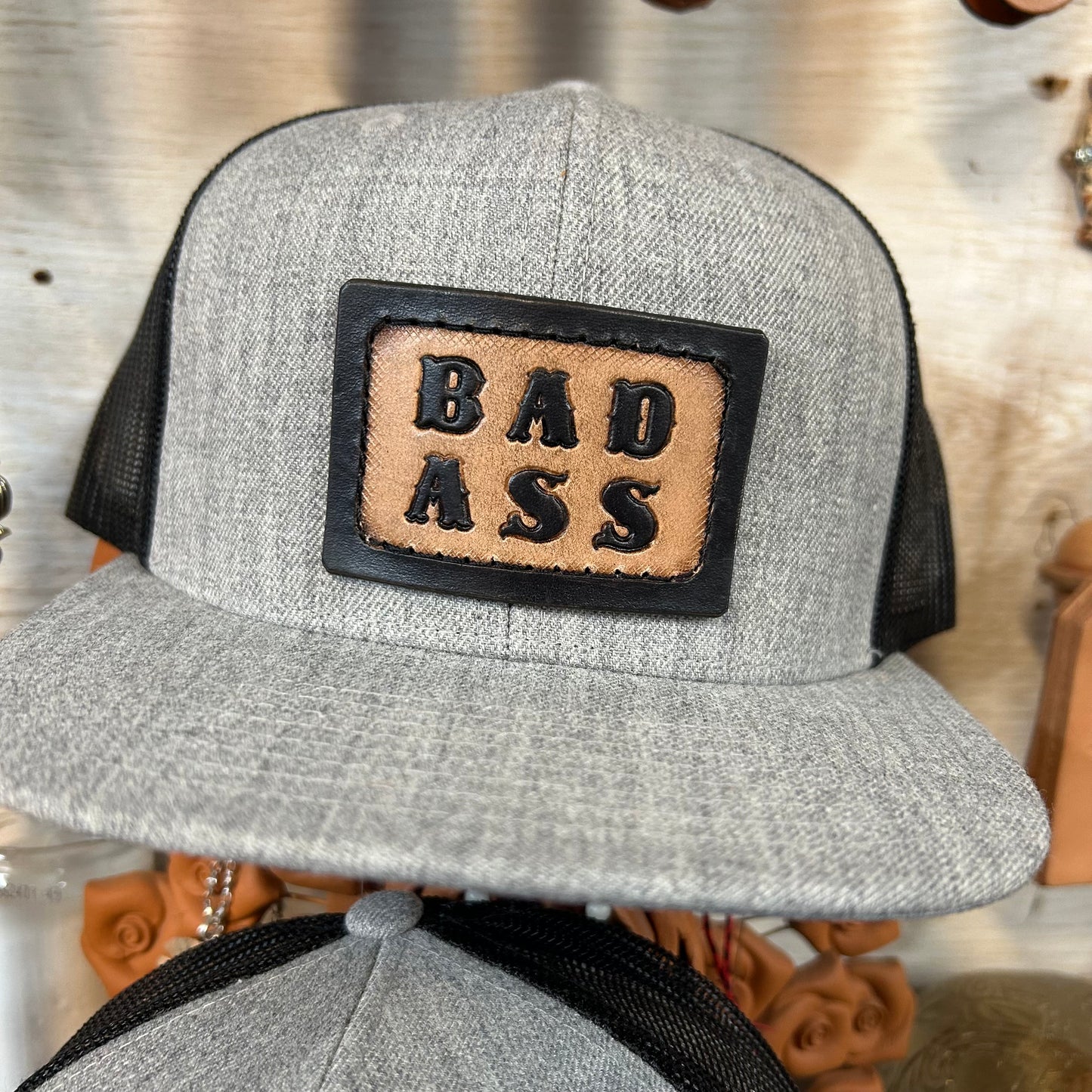 Say Less Leather Patch Trucker Hat