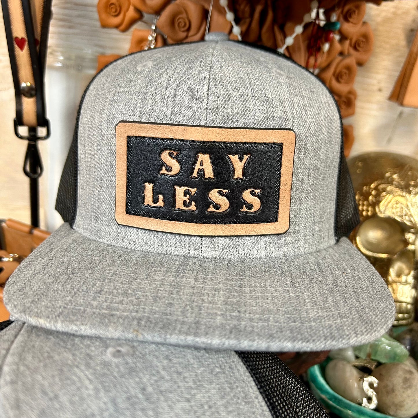 Say Less Leather Patch Trucker Hat